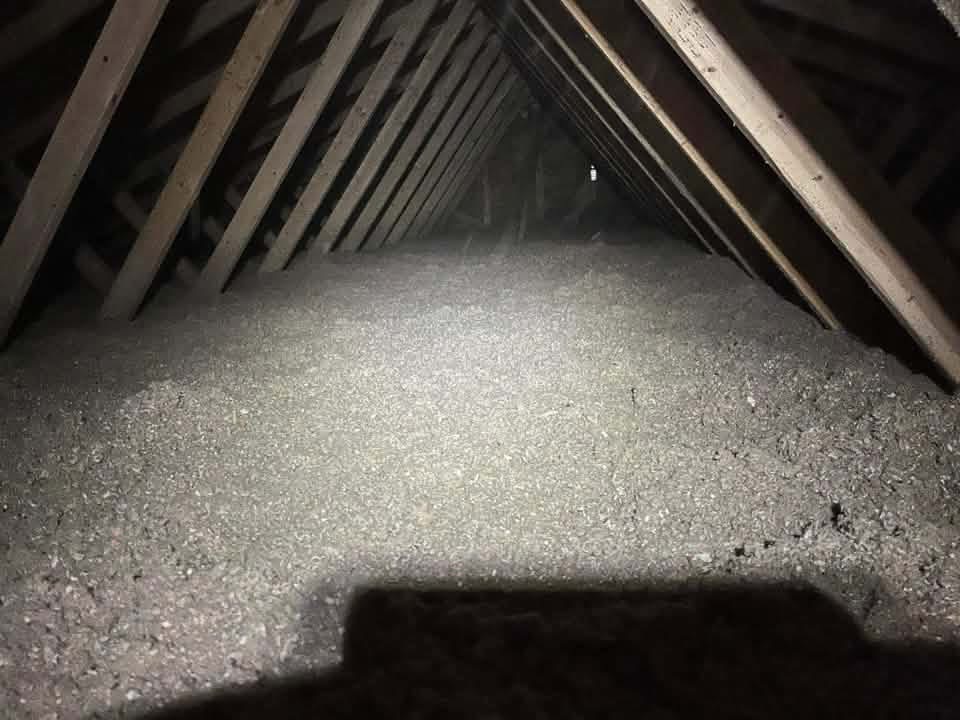 Completed Huntington attic with blown-in cellulose insulation installed to R-49 by JC Home Care Center